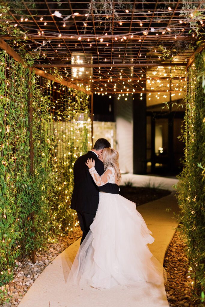 Bride and groom kissing at a San Antonio wedding venue