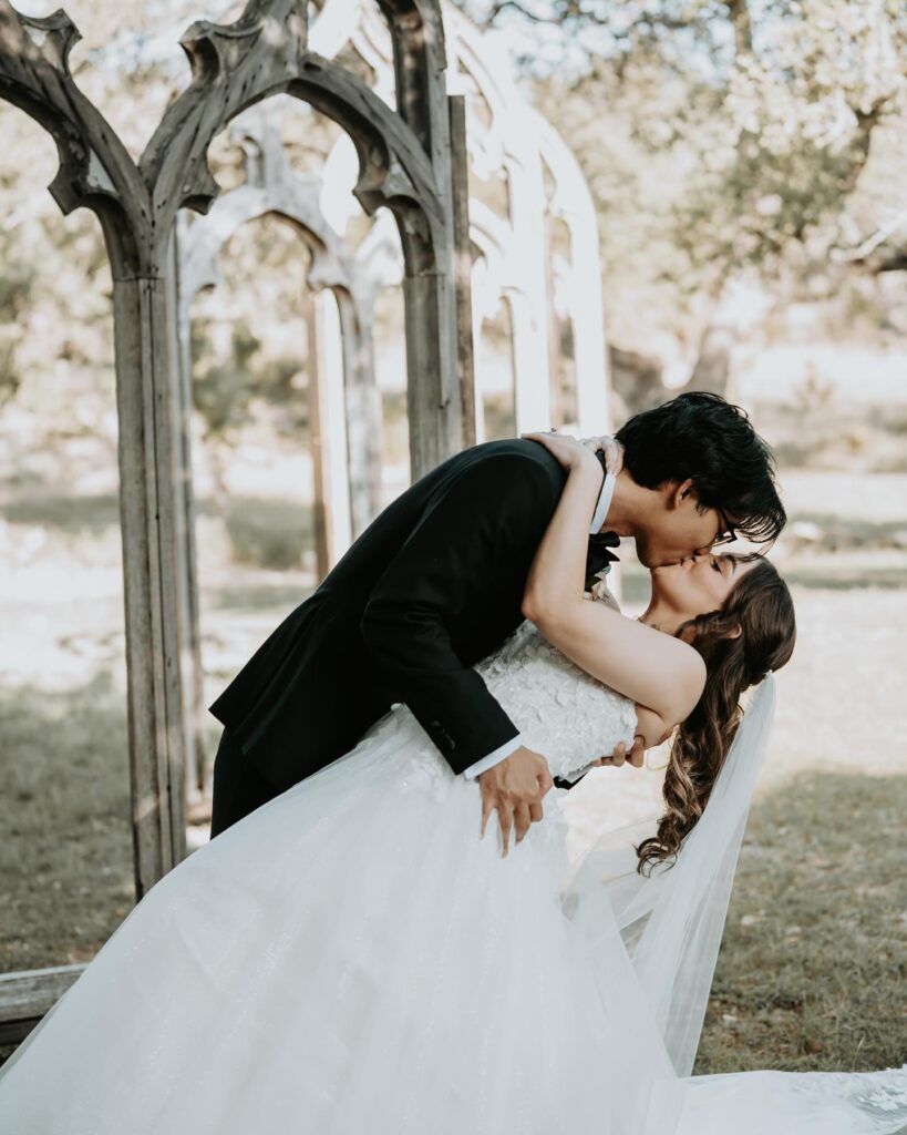 Bride and groom kissing at a San Antonio wedding venue
